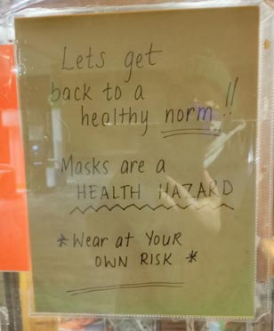 Covid Mask Denial Sign in Wisconsin